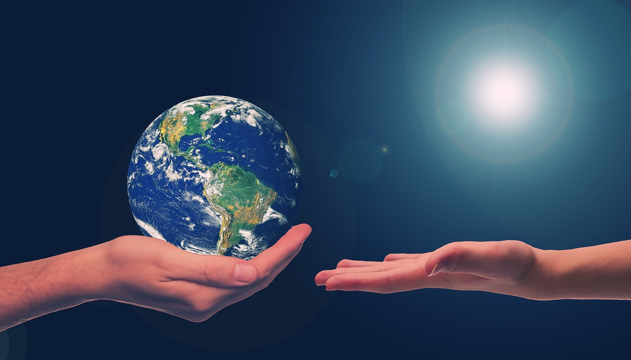 Handing over Earth, image by Gerd Altmann via Pixabay